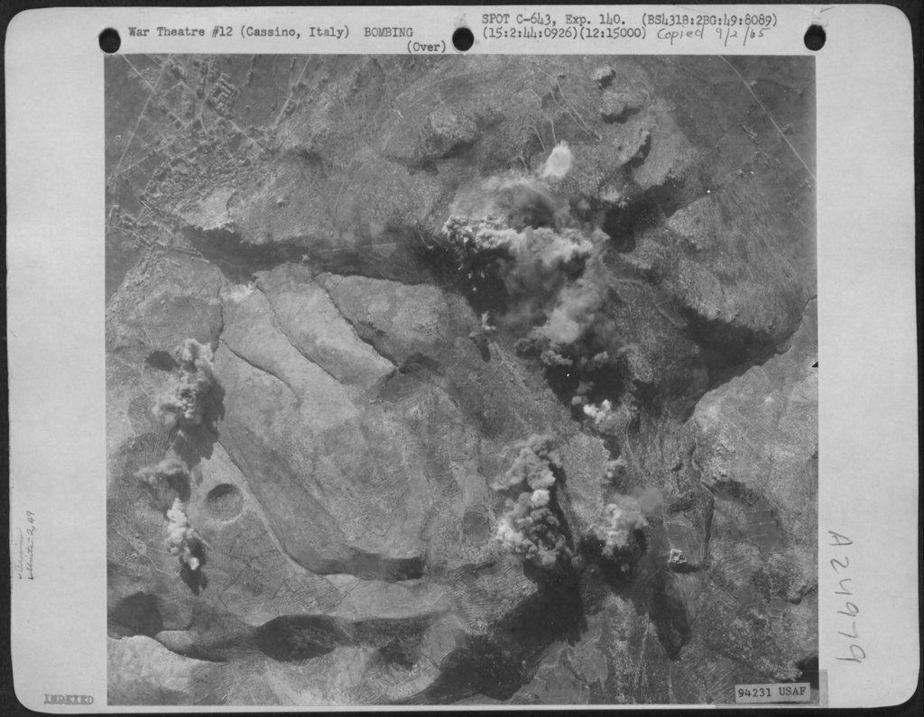 <p class='eng'>Bombs Burst On The Monastery At Cassino, Italy, After Planes Of The 2Nd Bomb Group, 49Th<br /> Bomb Squadron Dropped Their Bombs On 15 February 1944. (http://www.fold3.com/).</p>