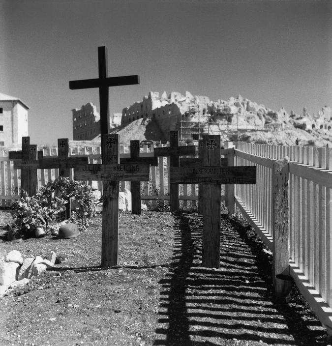 <p class='eng'>ITALY. Latium region. Village of Montecassino. Cemetery. Montecassino was the sight of one of the main battles fought by the Allies against the Germans in Italy (1944). The town was severly damaged, and the Medieval Abbey of Monte Cassino, which housed one of the main libraries from the Middle Ages, was completely destroyed during an air raid. 1946. Photographer: Werner Bischof.</p>